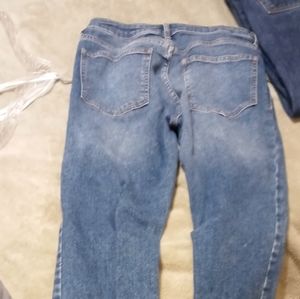 Various women's tops and jeans